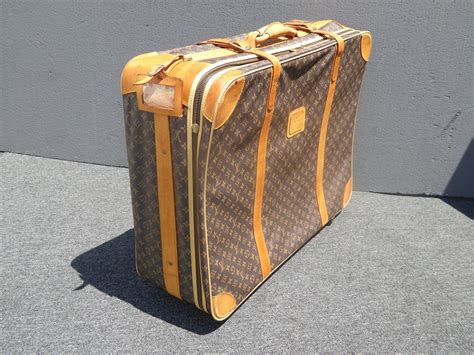 vintage Louis Vuitton rolling luggage